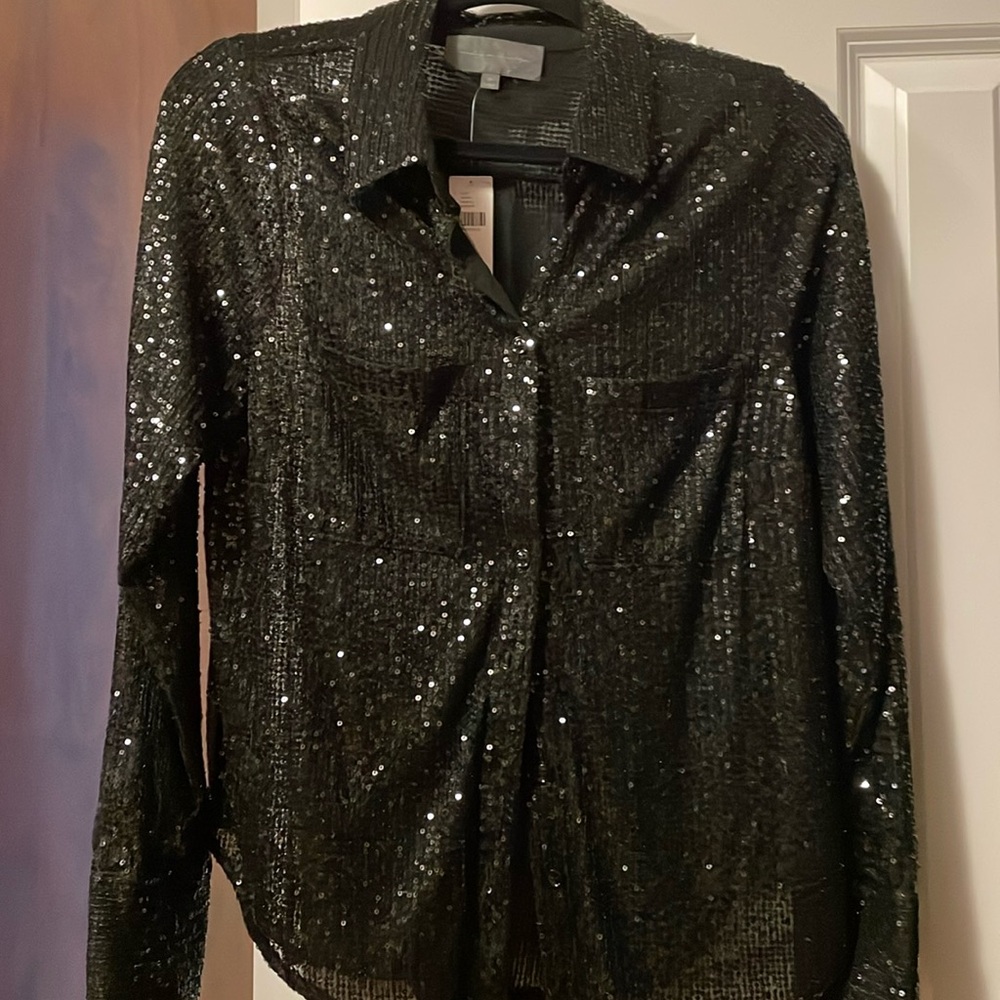 Black sequin blouse 
Lined somewhat sheer